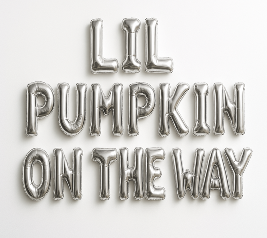 Silver balloon letters spelling 'LIL PUMPKIN ON THE WAY' on a white background