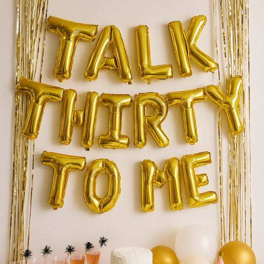 Talk Thirty to Me balloon banner for 30th birthday