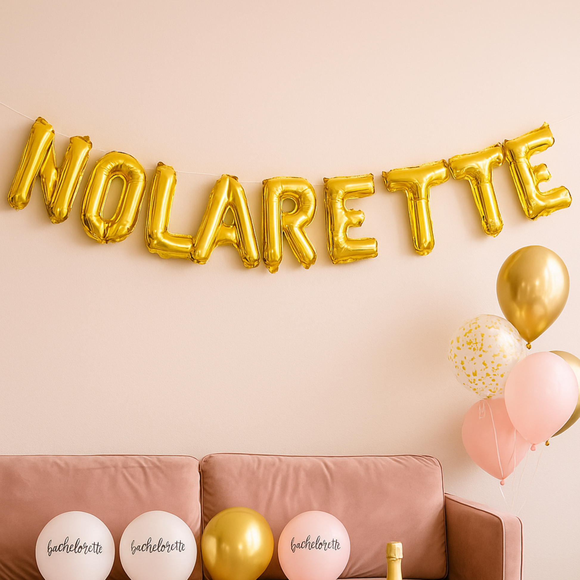 Foil balloon banner spelling Nolarette for New Orleans bachelorette party”