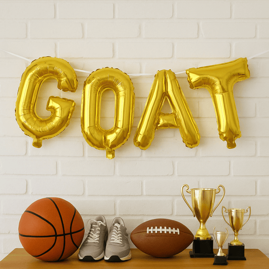 Gold foil letter balloons spelling GOAT for birthday or sports party