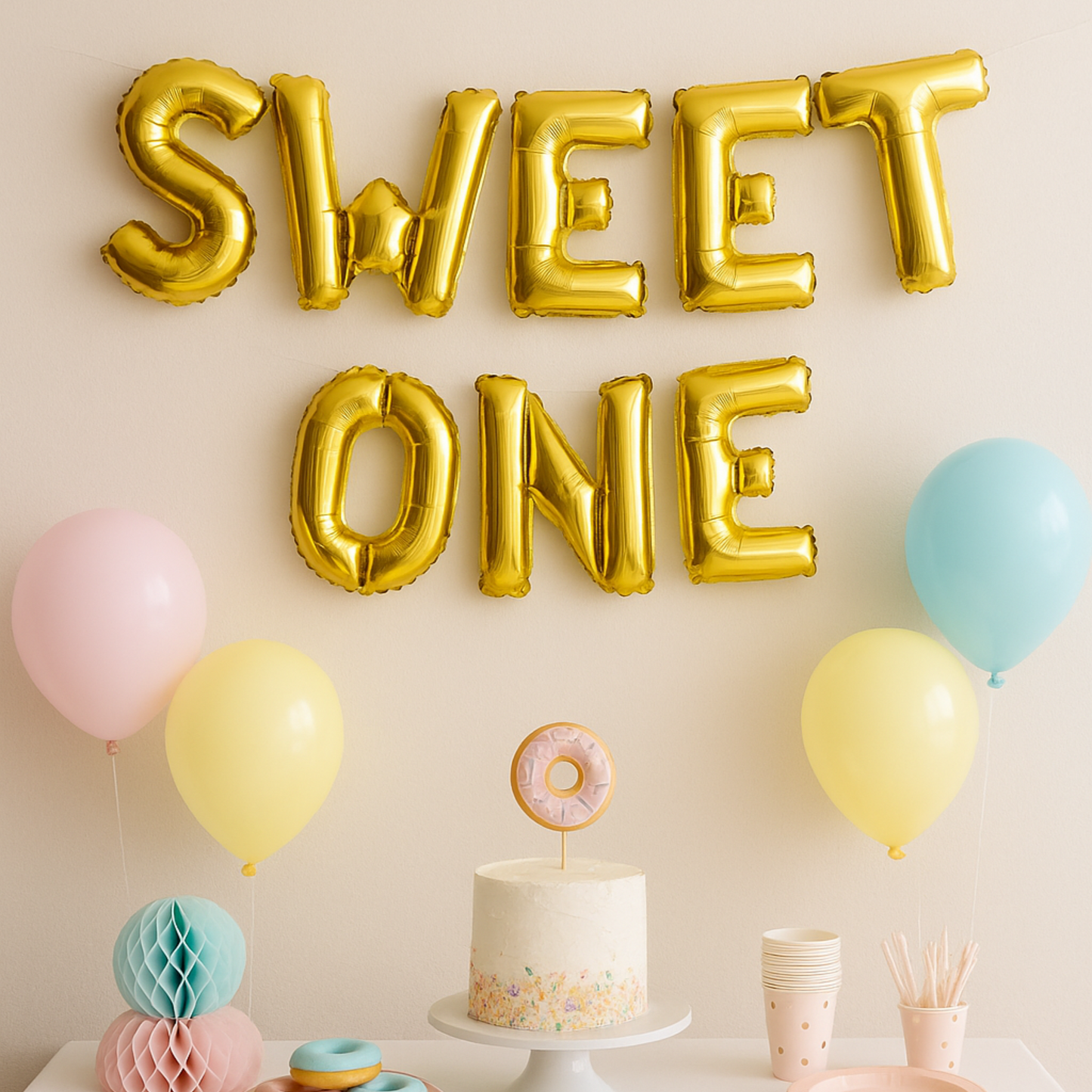Sweet One balloon banner in gold foil for 1st birthday