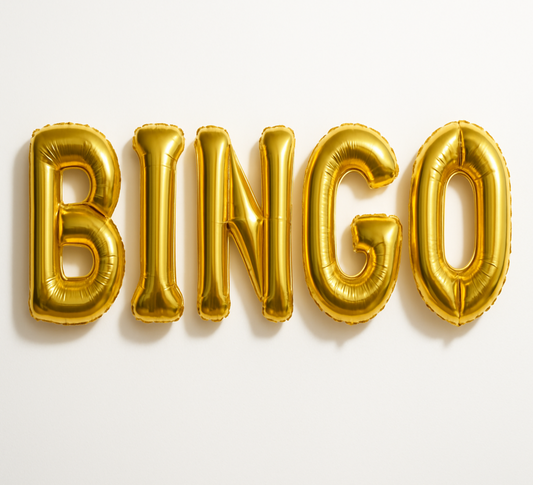 Create the phrase BINGO using gold foil letter balloons and white background. The letter balloons are 16 inches .