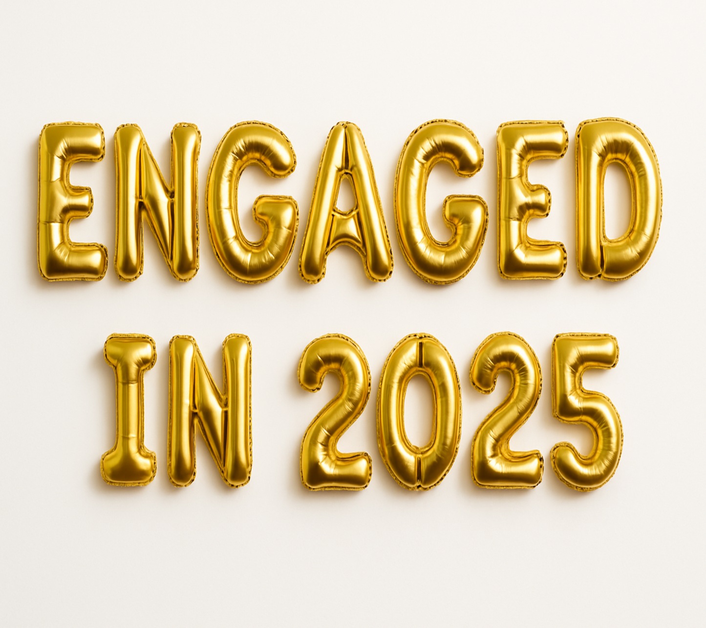 ENGAGED IN 2025 in gold foil letter balloons