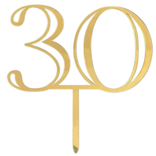 Gold cake topper with the number '30' on a white background
