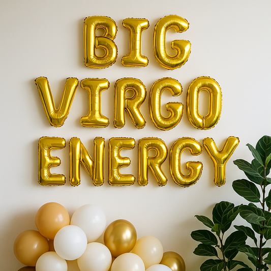 Gold letter balloons spelling 'BIG VIRGO ENERGY' with balloons and a plant in the foreground.