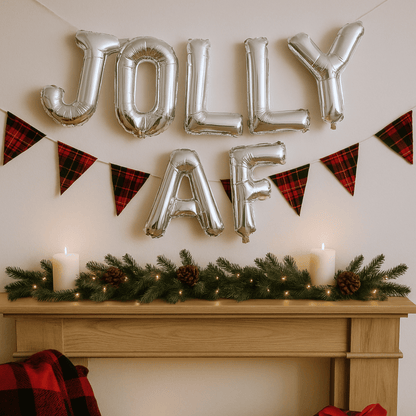 Jolly AF foil balloon banner for Friendsmas Christmas party