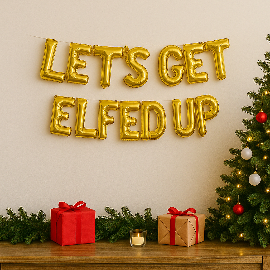 Gold 'LET'S GET ELFED UP' balloons above Christmas decorations on a table.