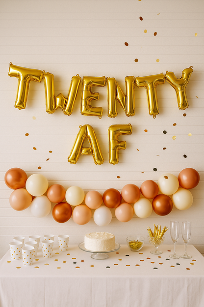 Gold foil 'Twenty AF' balloons hanging as party backdrop"