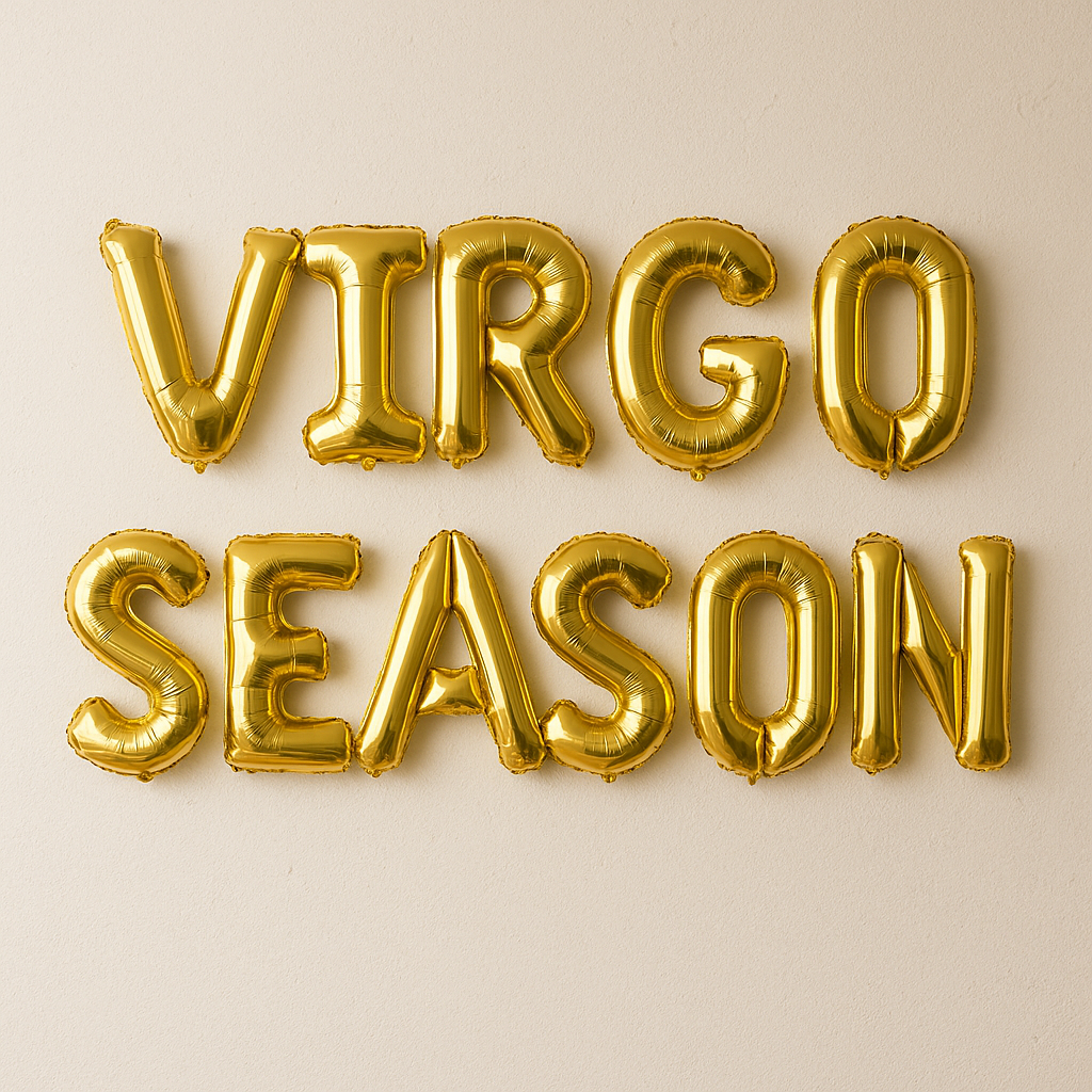 Gold foil balloons spelling 'VIRGO SEASON' on a beige background