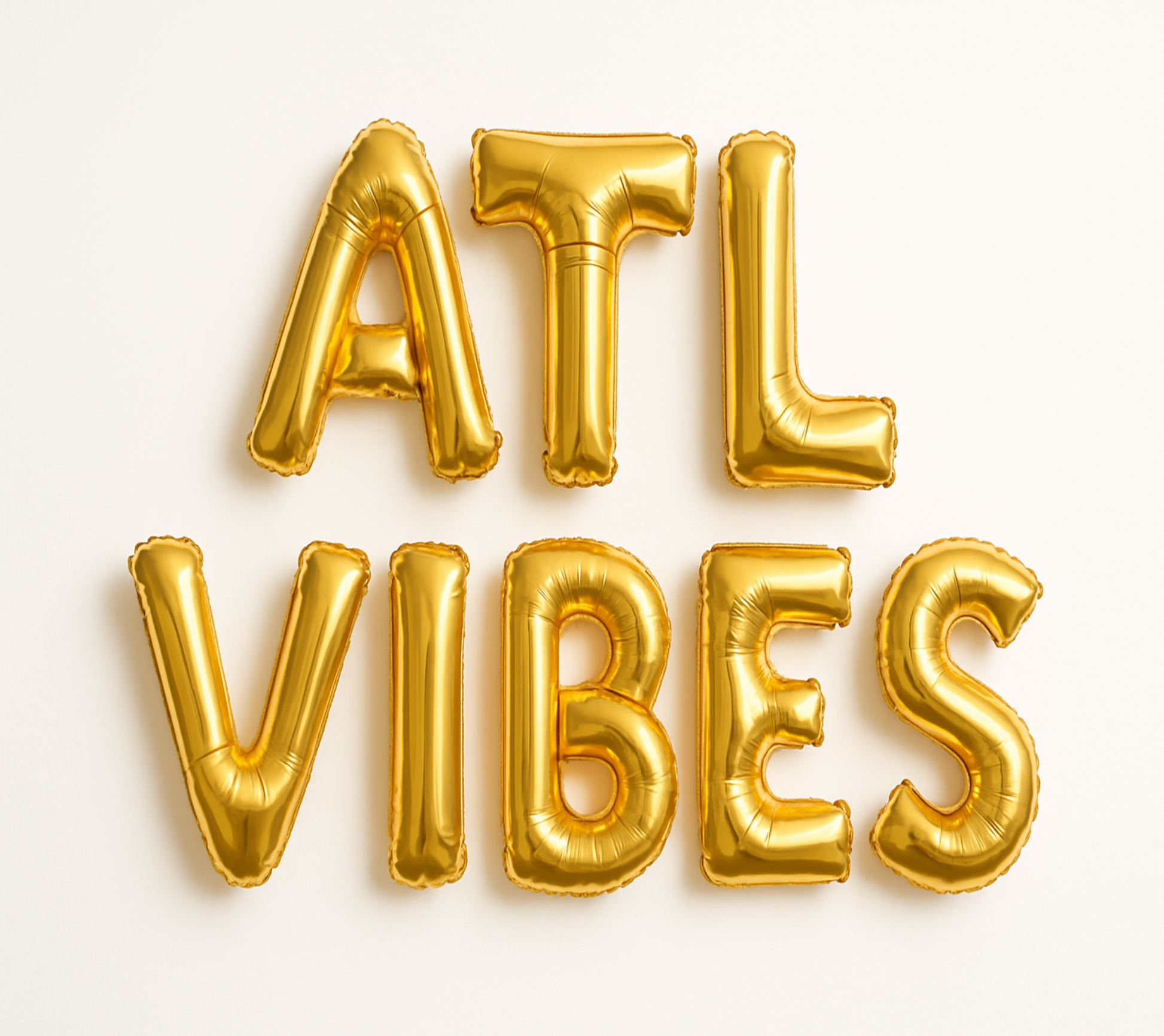 ATL VIBES in gold foil letter balloons on white background. All letters should be the same size with no strings.

