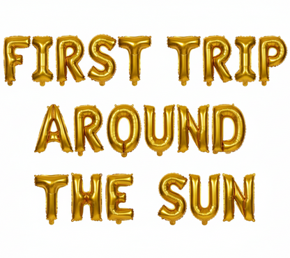 FIRST TRIP AROUND THE SUN in gold foil letter balloons