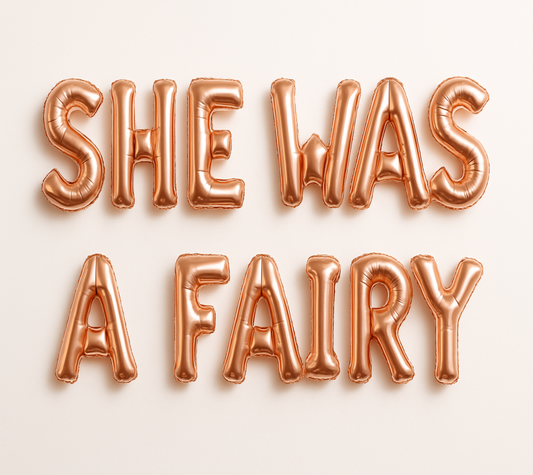 SHE WAS A FAIRY in rose gold foil letter balloons 
