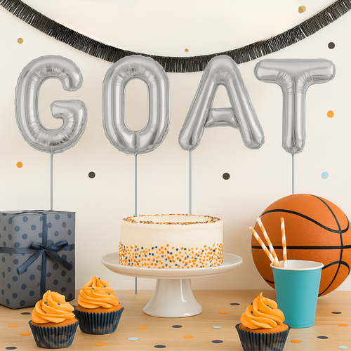 Silver foil letter balloons spelling 'GOAT' for party decoration